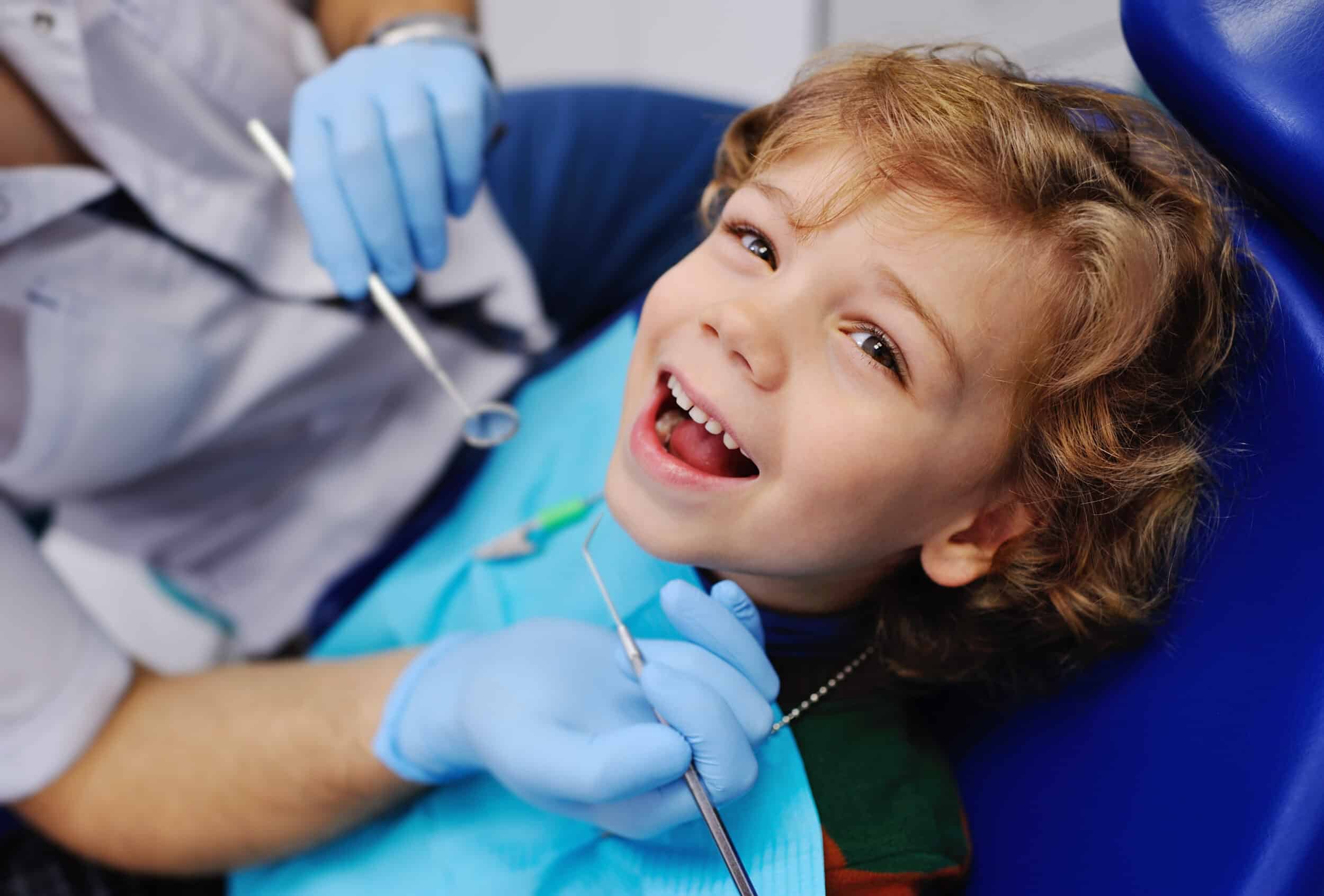 Boston child visits dentist for routine cleaning and examination.